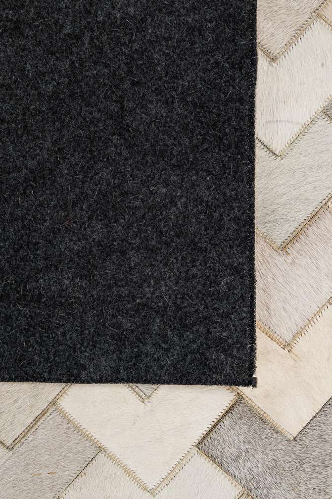 5' 2 x 7' 11 Cowhide - Patchwork Rug