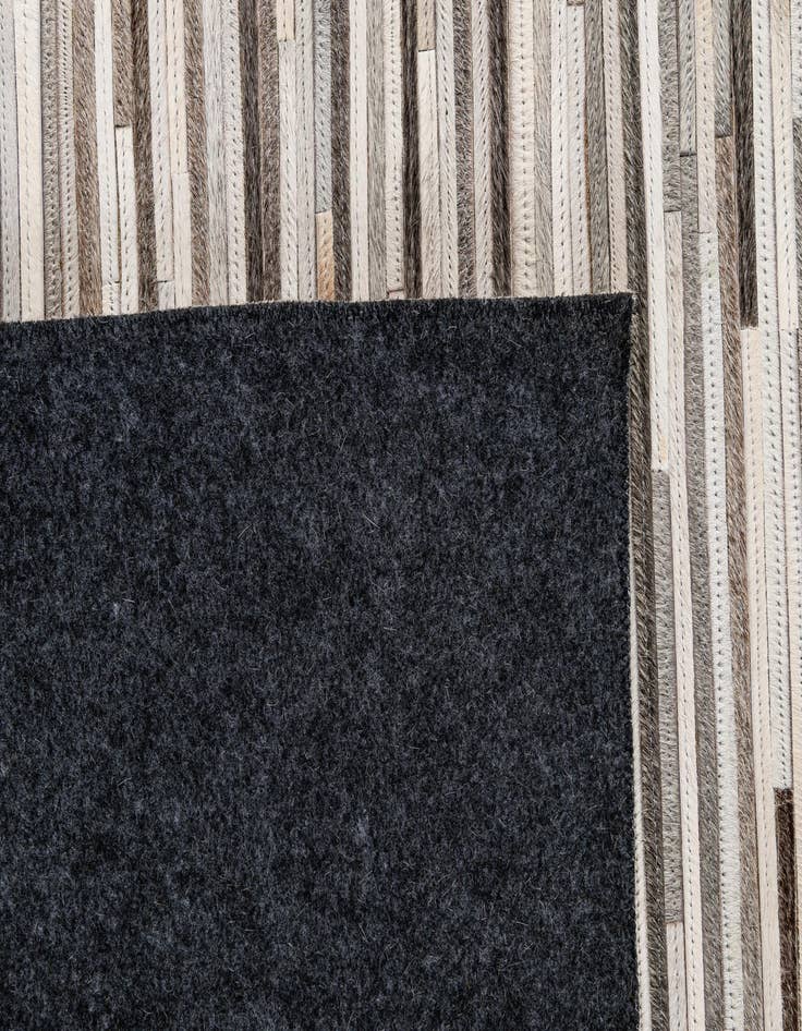 Detail image of 5' 2 x 8' Cowhide - Patchwork Rug