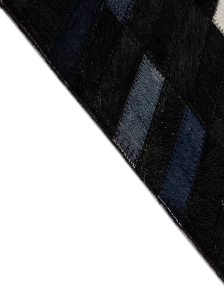 Detail image of 5' 2 x 8' Cowhide - Patchwork Rug