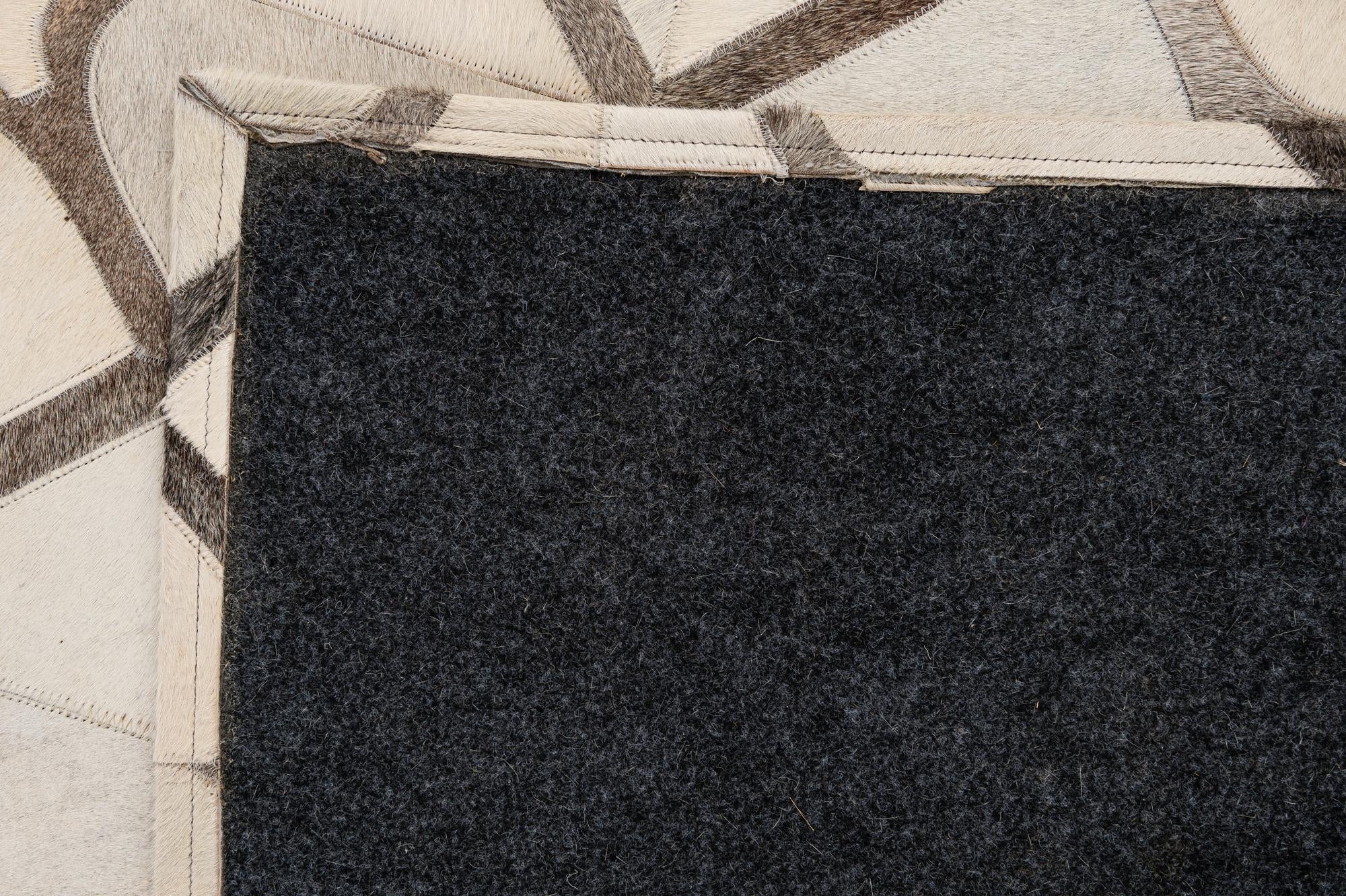5' x 7' 11 Cowhide - Patchwork Rug