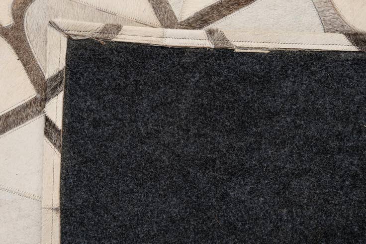 Detail image of 5' x 7' 11 Cowhide - Patchwork Rug