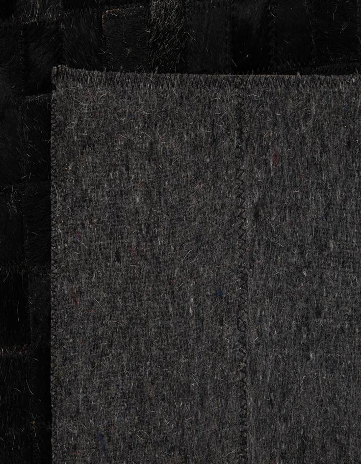 Detail image of 5' x 7' 11 Cowhide - Patchwork Rug