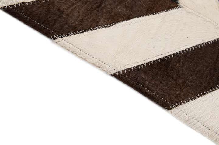 5' 1 x 7' 11 Cowhide - Patchwork Rug