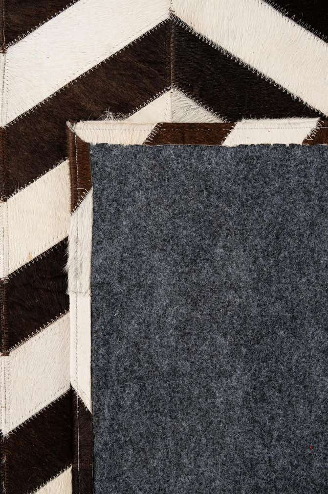 5' 1 x 7' 11 Cowhide - Patchwork Rug