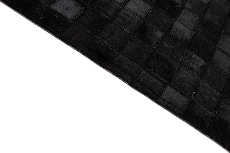 Detail image of 5' 1 x 8' 1 Cowhide - Patchwork Rug