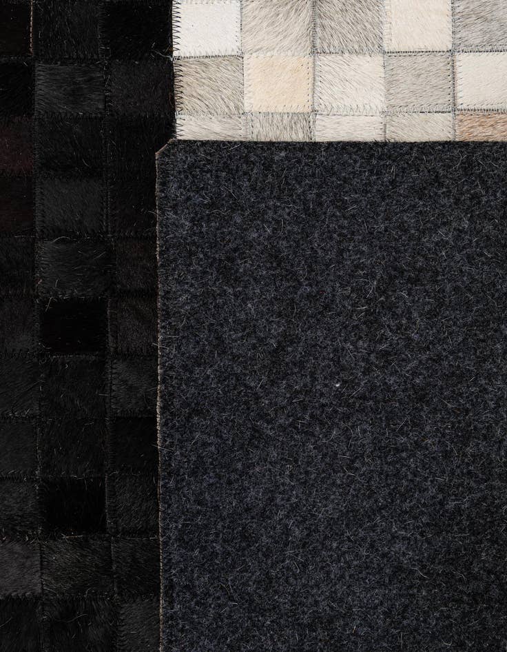 Detail image of 5' 1 x 8' 1 Cowhide - Patchwork Rug