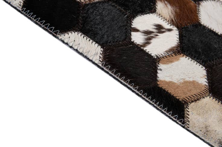 Detail image of 5' 1 x 8' Cowhide - Patchwork Rug
