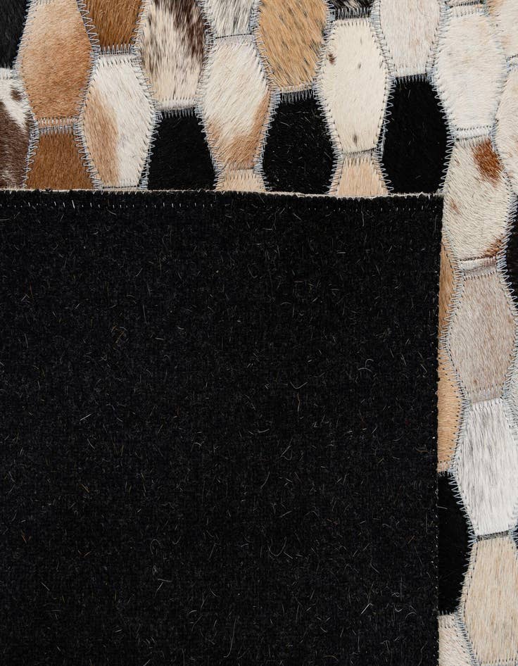 Detail image of 5' 1 x 8' Cowhide - Patchwork Rug