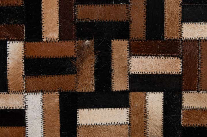 4' 11 x 8' Cowhide - Patchwork Rug