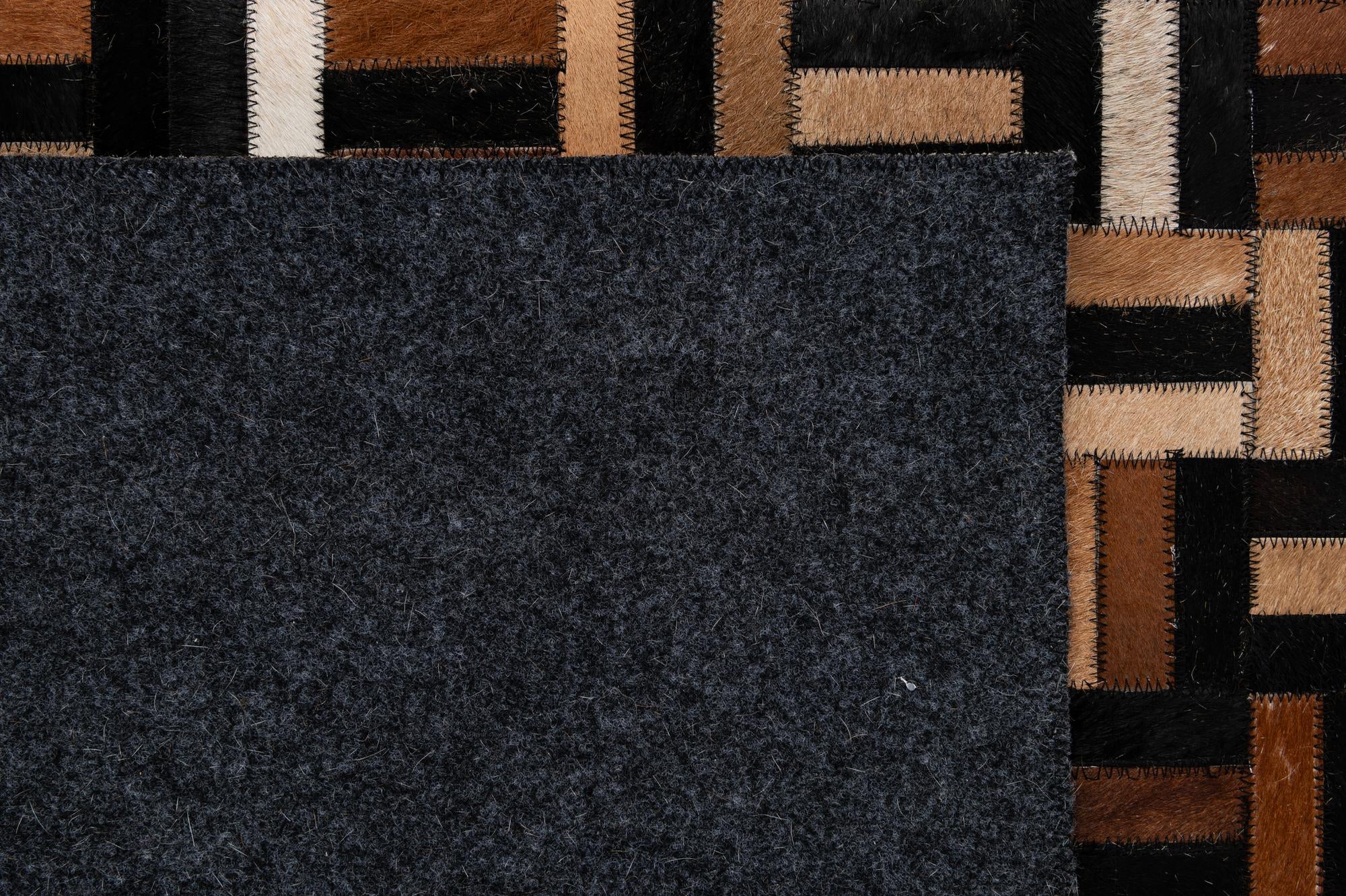 4' 11 x 8' Cowhide - Patchwork Rug