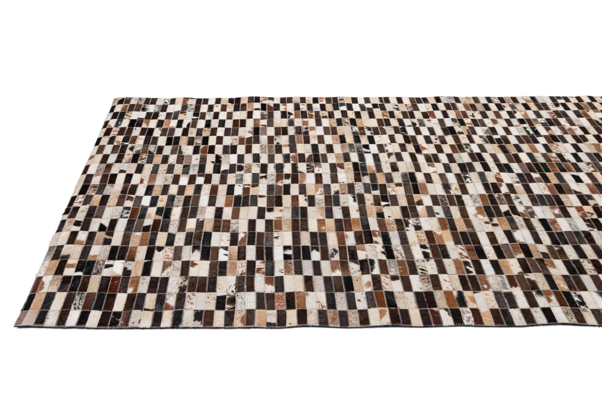 4' 11 x 7' 11 Cowhide - Patchwork Rug