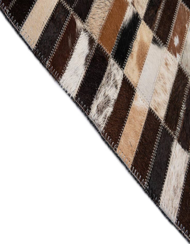 Detail image of 4' 11 x 7' 11 Cowhide - Patchwork Rug