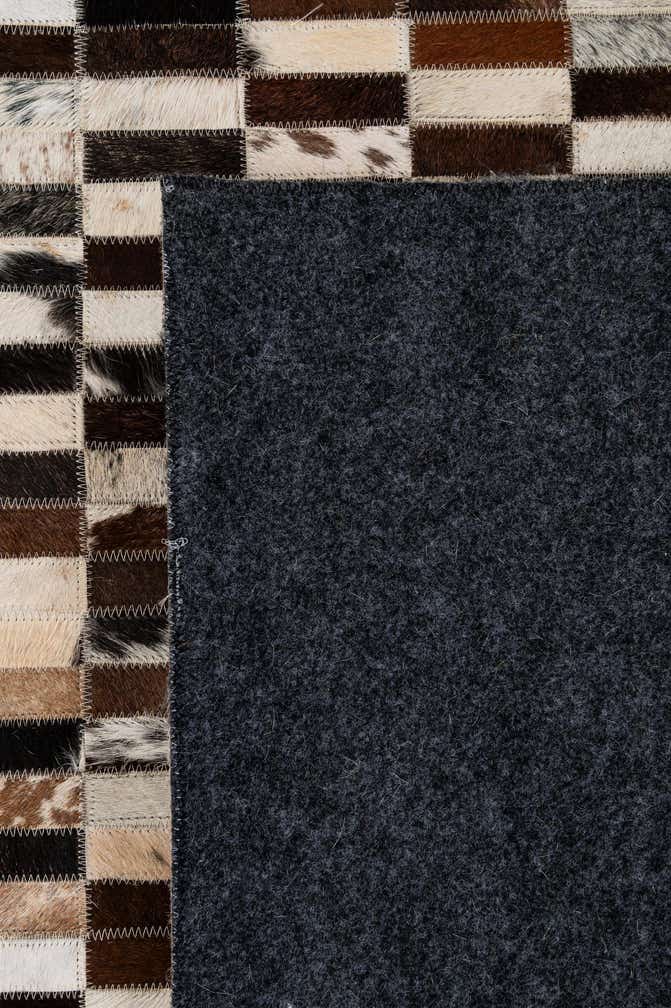 4' 11 x 7' 11 Cowhide - Patchwork Rug