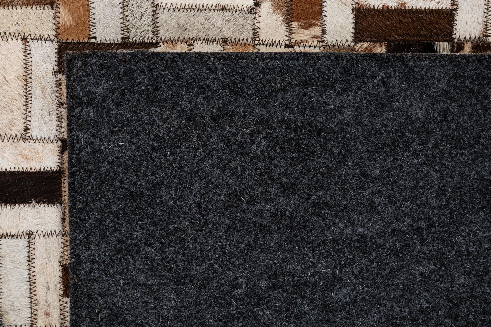 5' 2 x 7' 11 Cowhide - Patchwork Rug