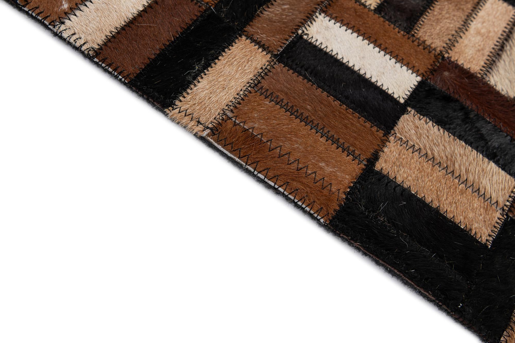 4' 11 x 7' 9 Cowhide - Patchwork Rug