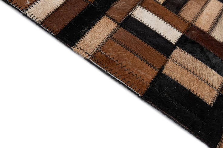 Detail image of 4' 11 x 7' 9 Cowhide - Patchwork Rug