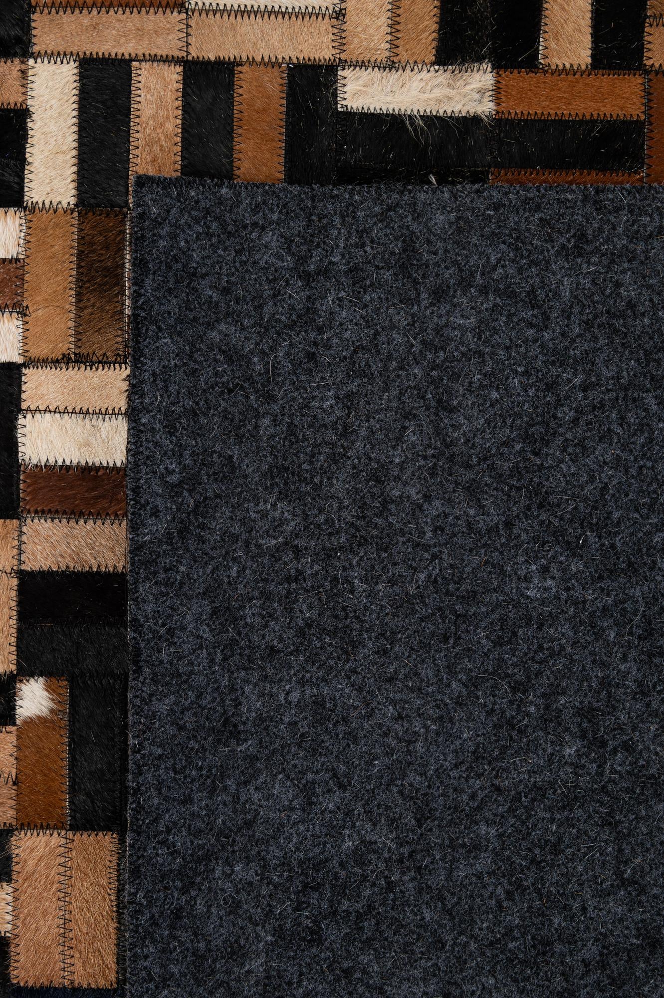 4' 11 x 7' 9 Cowhide - Patchwork Rug