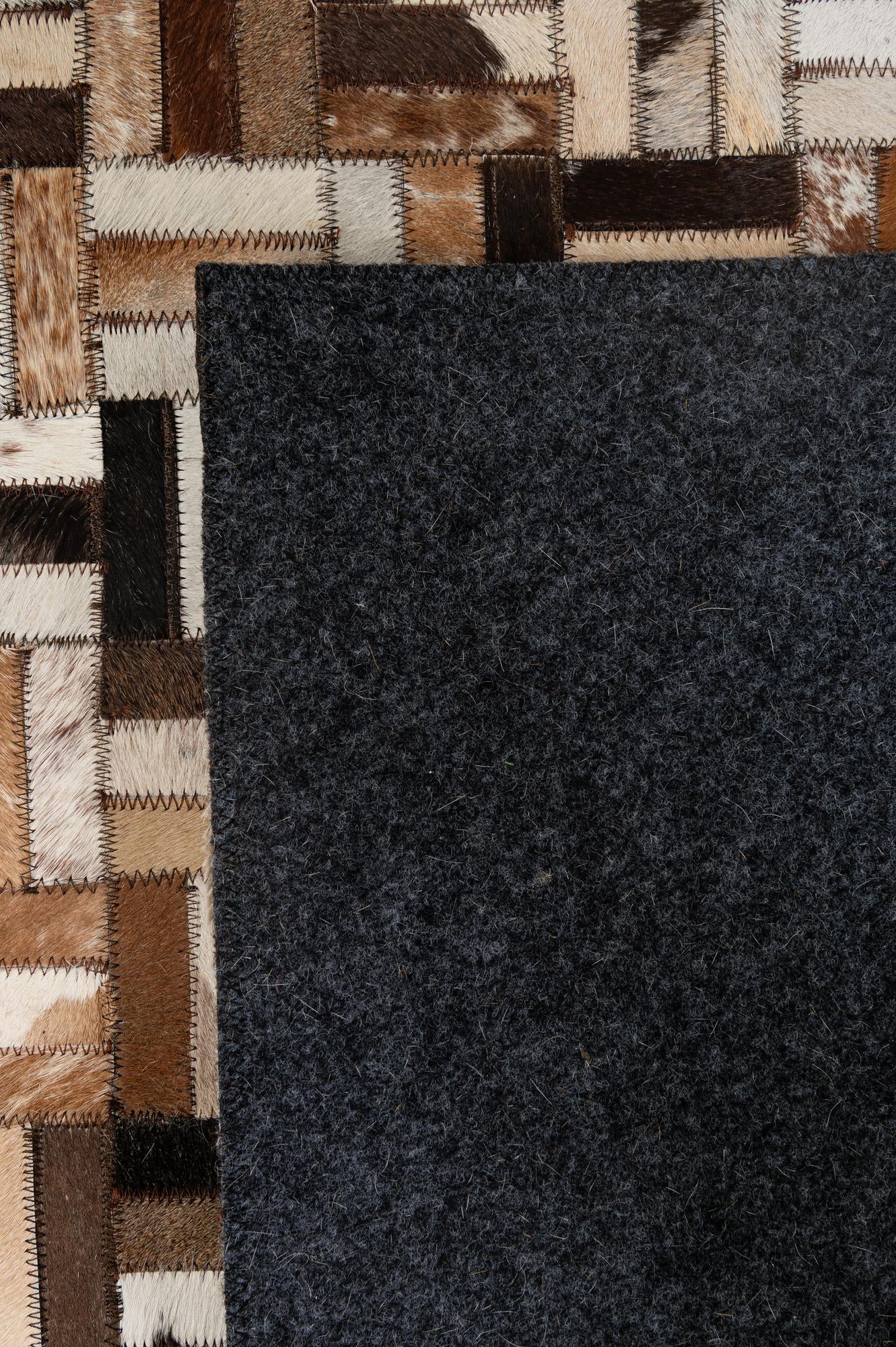 5' 1 x 7' 11 Cowhide - Patchwork Rug