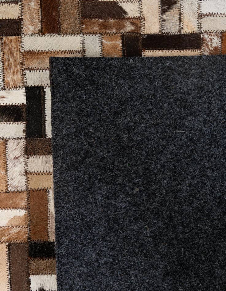 Detail image of 5' 1 x 7' 11 Cowhide - Patchwork Rug