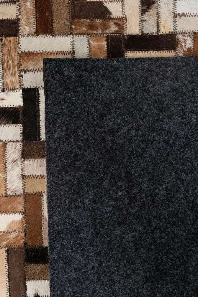 5' 1 x 7' 11 Cowhide - Patchwork Rug