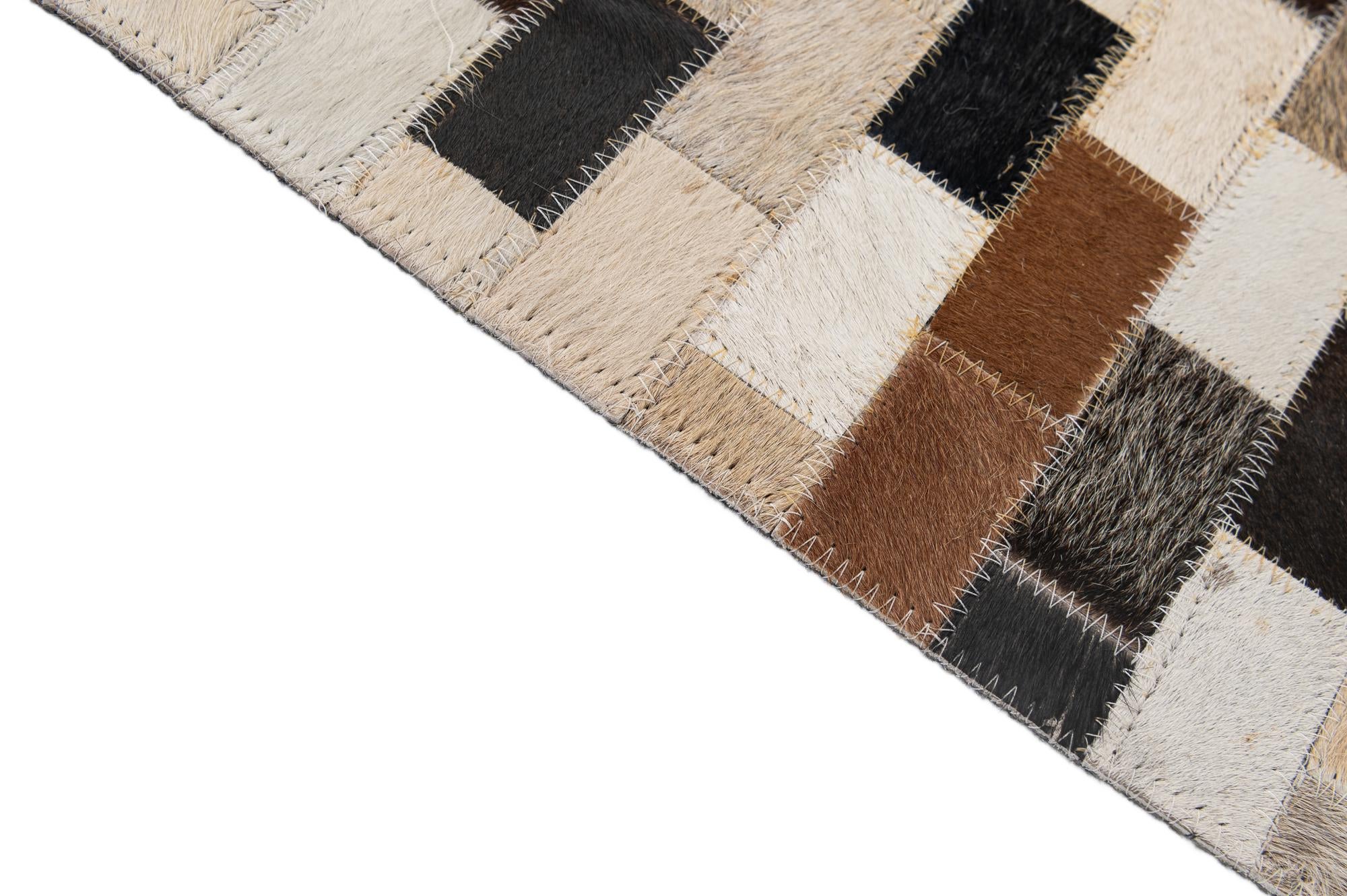 5' 1 x 7' 11 Cowhide - Patchwork Rug
