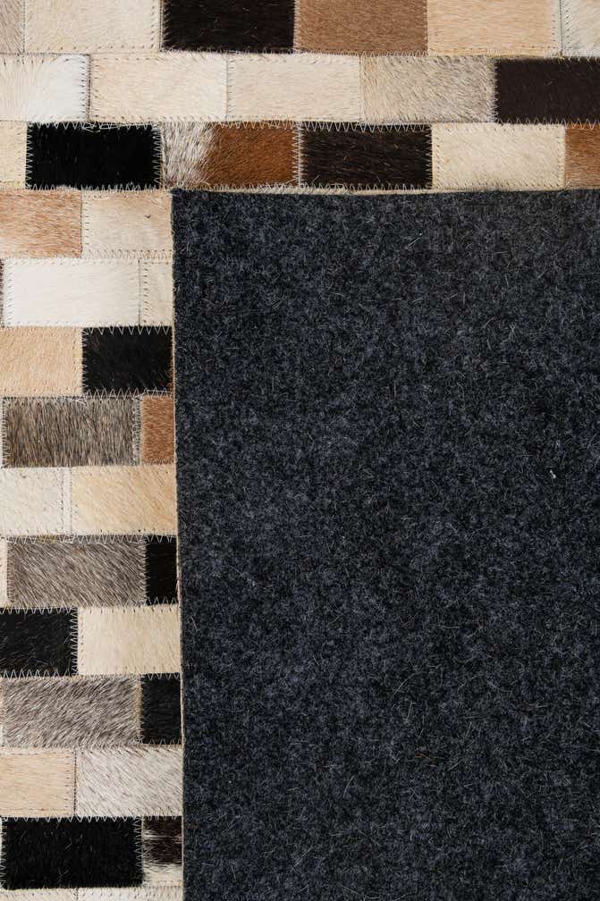 5' 1 x 7' 11 Cowhide - Patchwork Rug