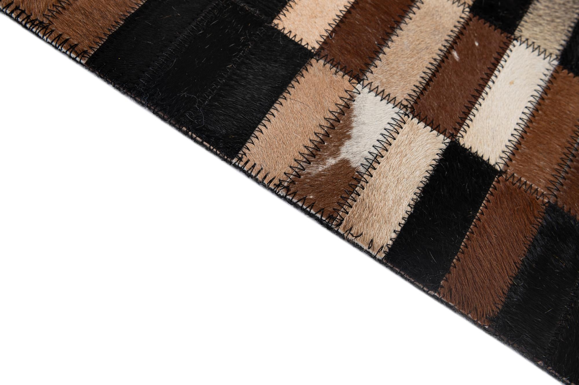 5' 2 x 8' 1 Cowhide - Patchwork Rug