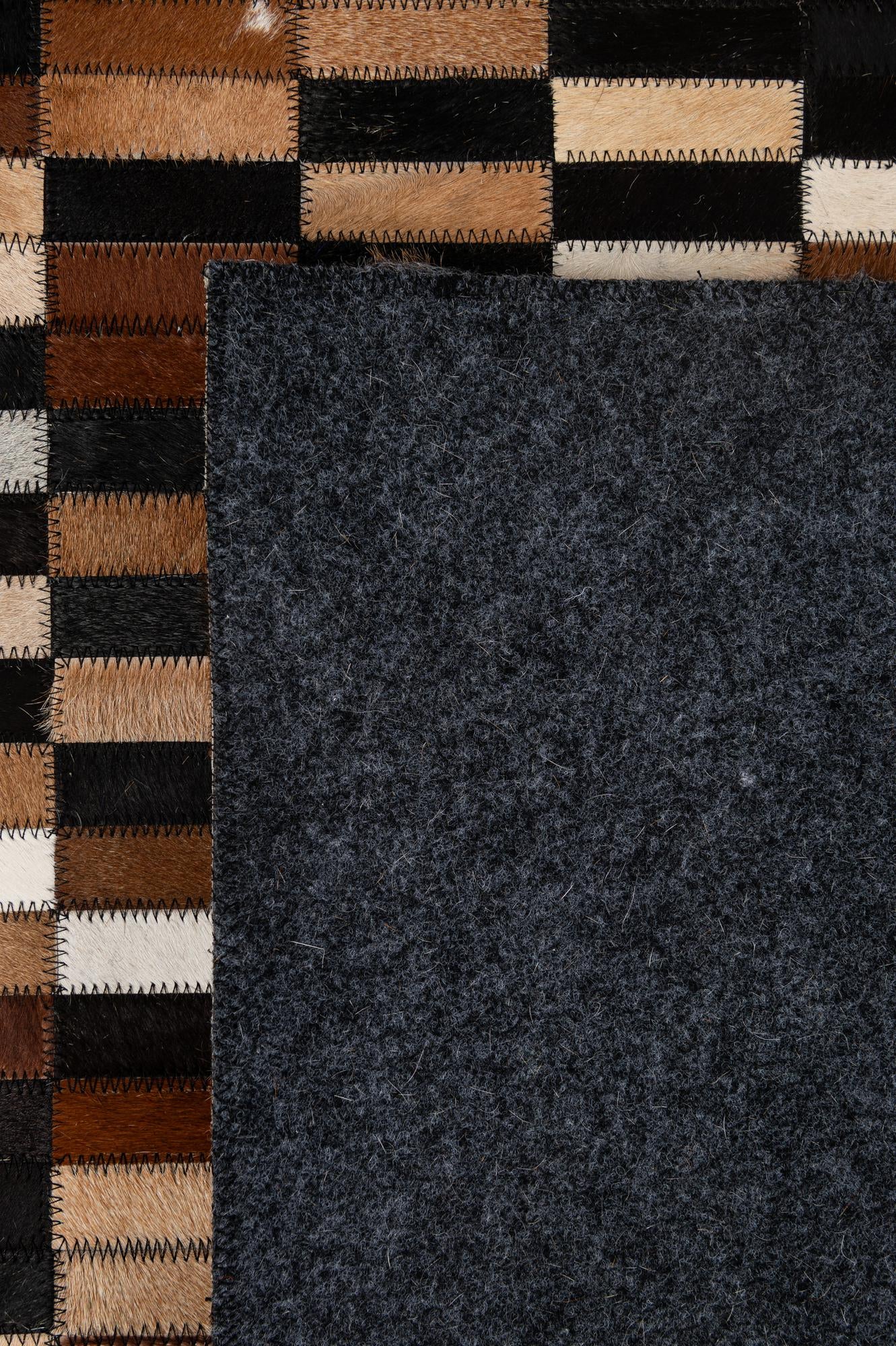 5' 2 x 8' 1 Cowhide - Patchwork Rug