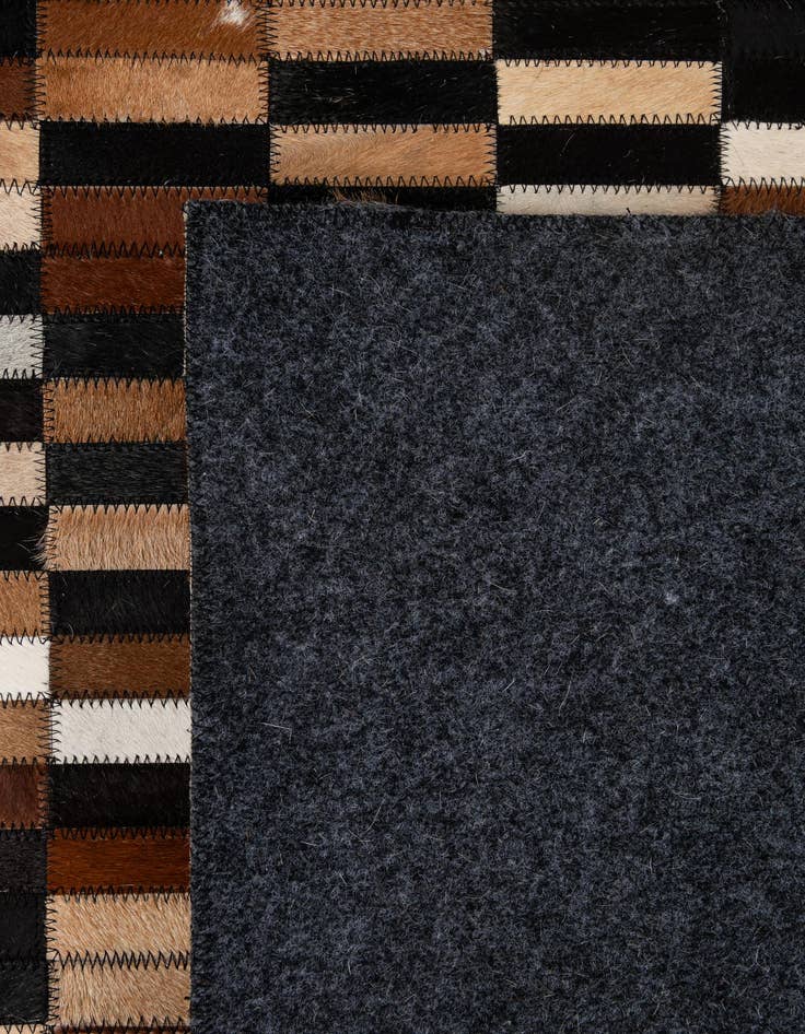 Detail image of 5' 2 x 8' 1 Cowhide - Patchwork Rug