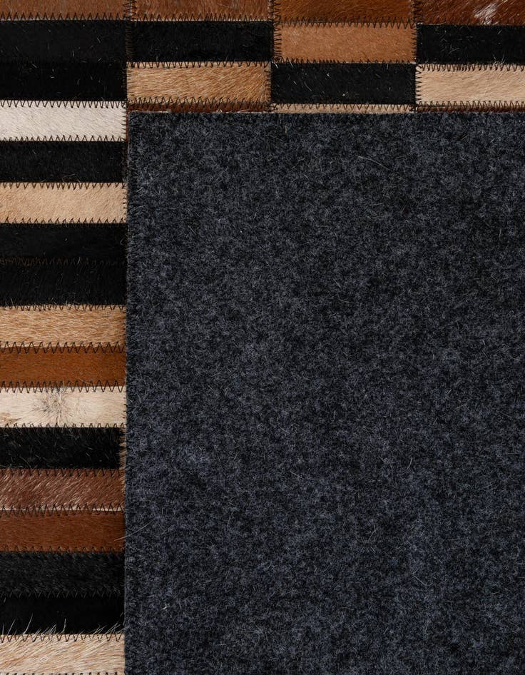 Detail image of 5' x 7' 11 Cowhide - Patchwork Rug