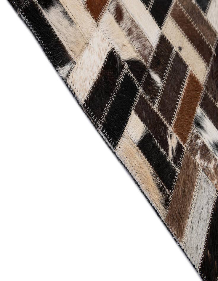 Detail image of 5' x 7' 11 Cowhide - Patchwork Rug