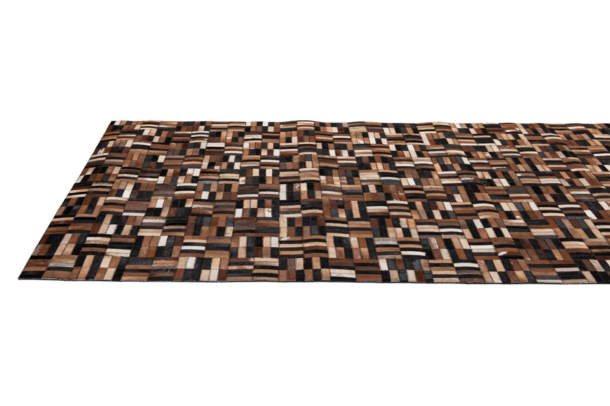 4' 11 x 7' 10 Cowhide - Patchwork Rug