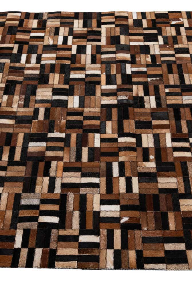 4' 11 x 7' 10 Cowhide - Patchwork Rug