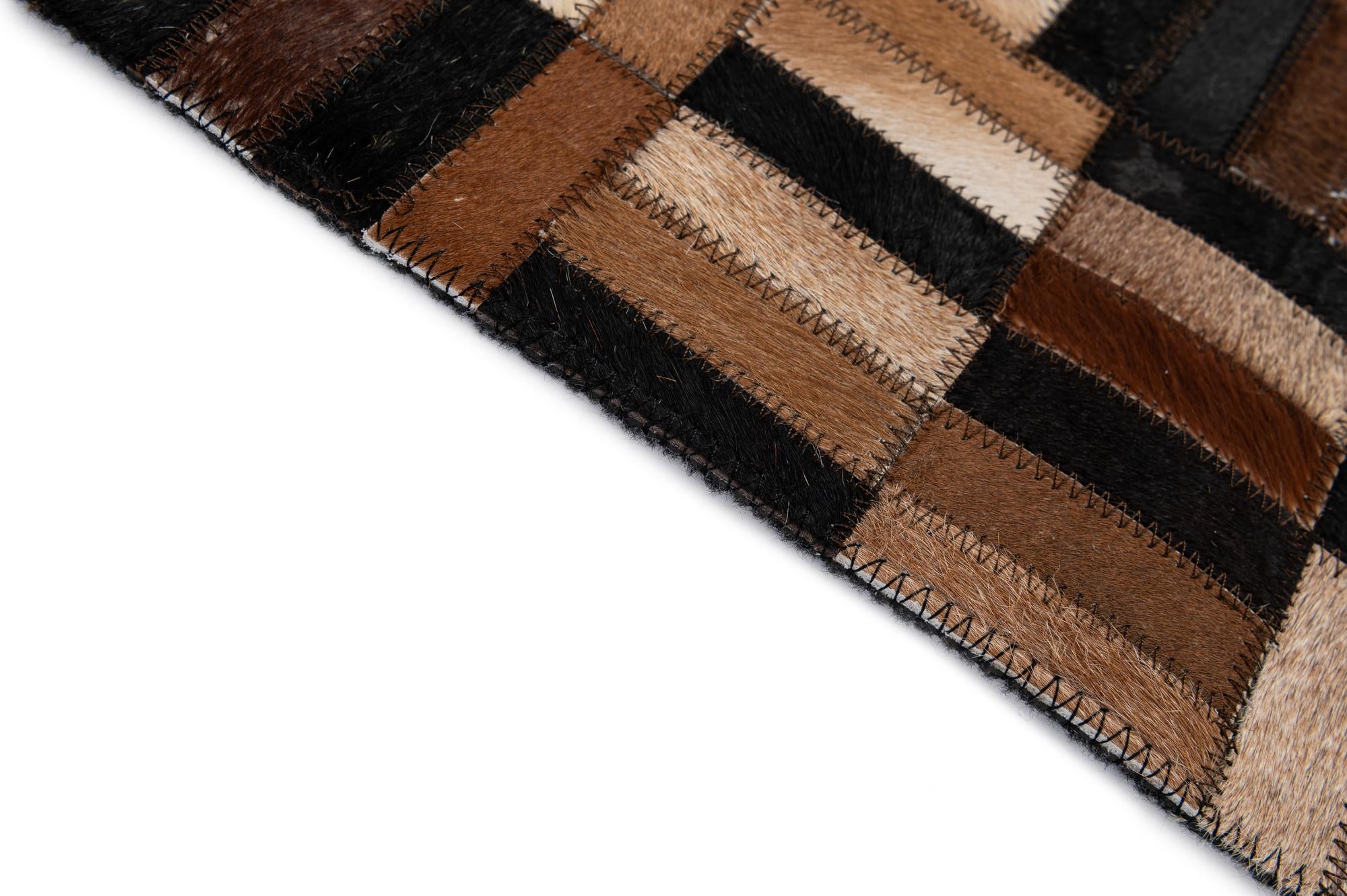 4' 11 x 7' 10 Cowhide - Patchwork Rug