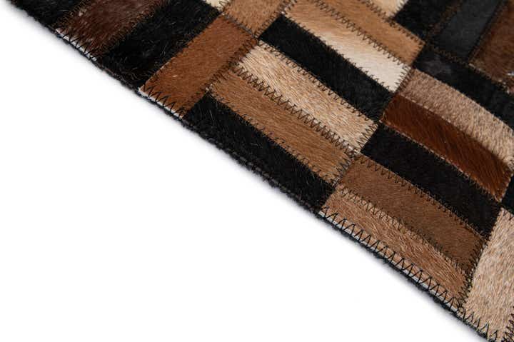 4' 11 x 7' 10 Cowhide - Patchwork Rug