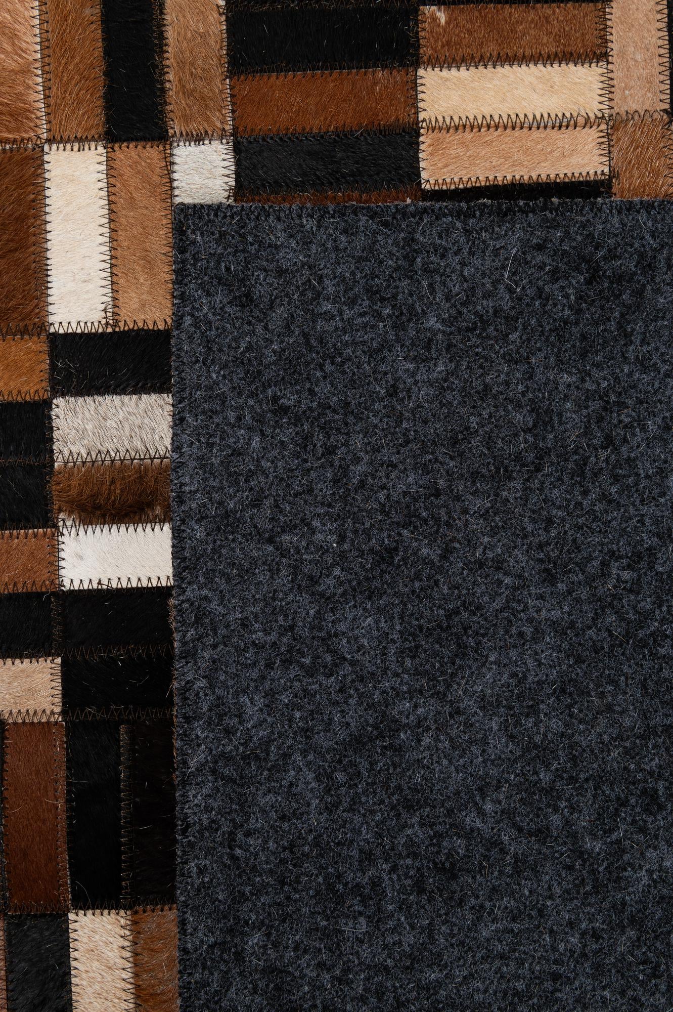 4' 11 x 7' 10 Cowhide - Patchwork Rug