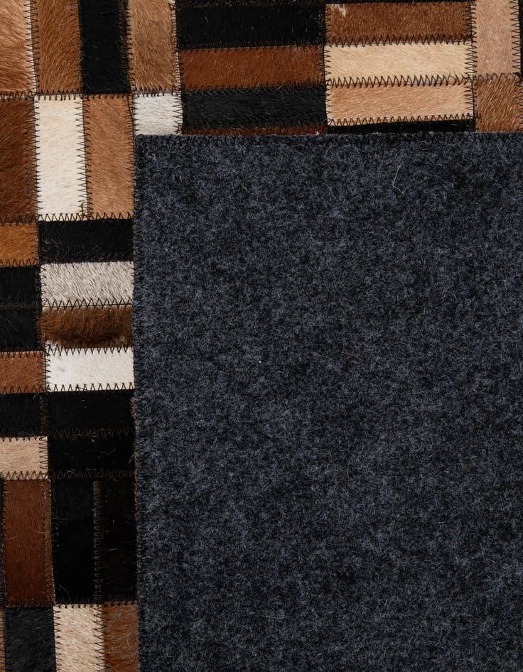 Detail image of 4' 11 x 7' 10 Cowhide - Patchwork Rug