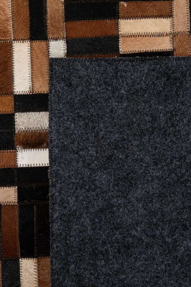4' 11 x 7' 10 Cowhide - Patchwork Rug