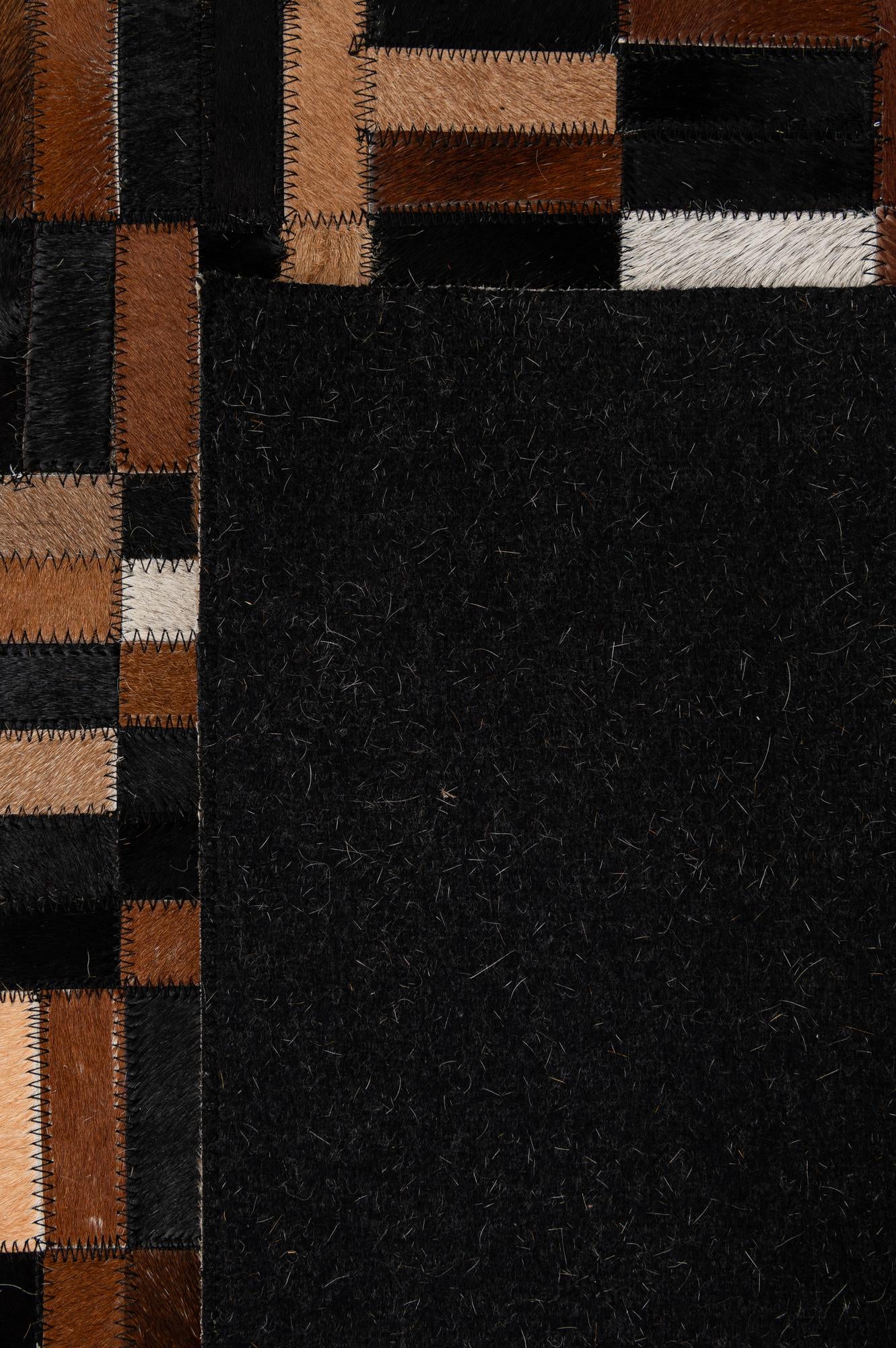 4' 11 x 7' 11 Cowhide - Patchwork Rug