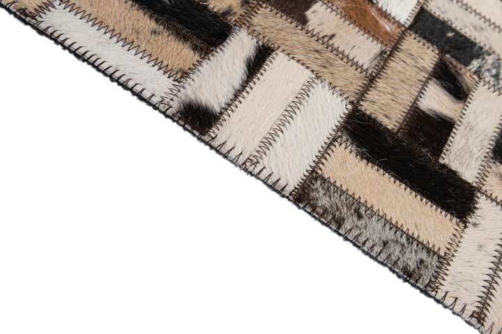 4' 11 x 7' 9 Cowhide - Patchwork Rug