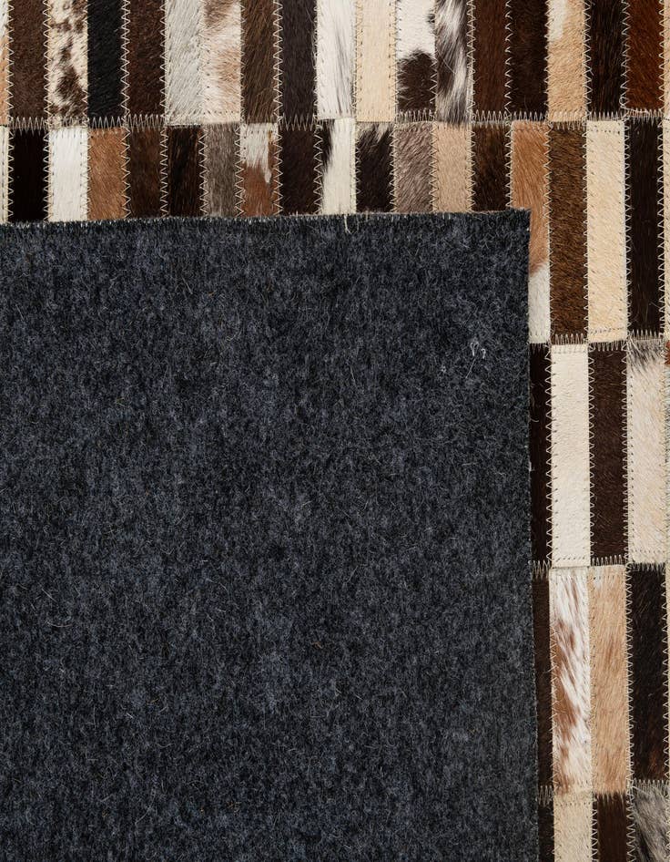 Detail image of 5' x 7' 11 Cowhide - Patchwork Rug