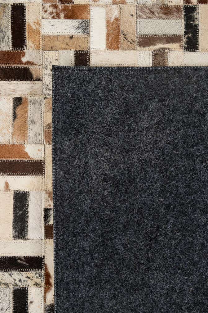 4' 11 x 7' 11 Cowhide - Patchwork Rug