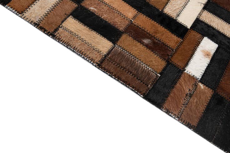 Detail image of 4' 11 x 8' 1 Cowhide - Patchwork Rug