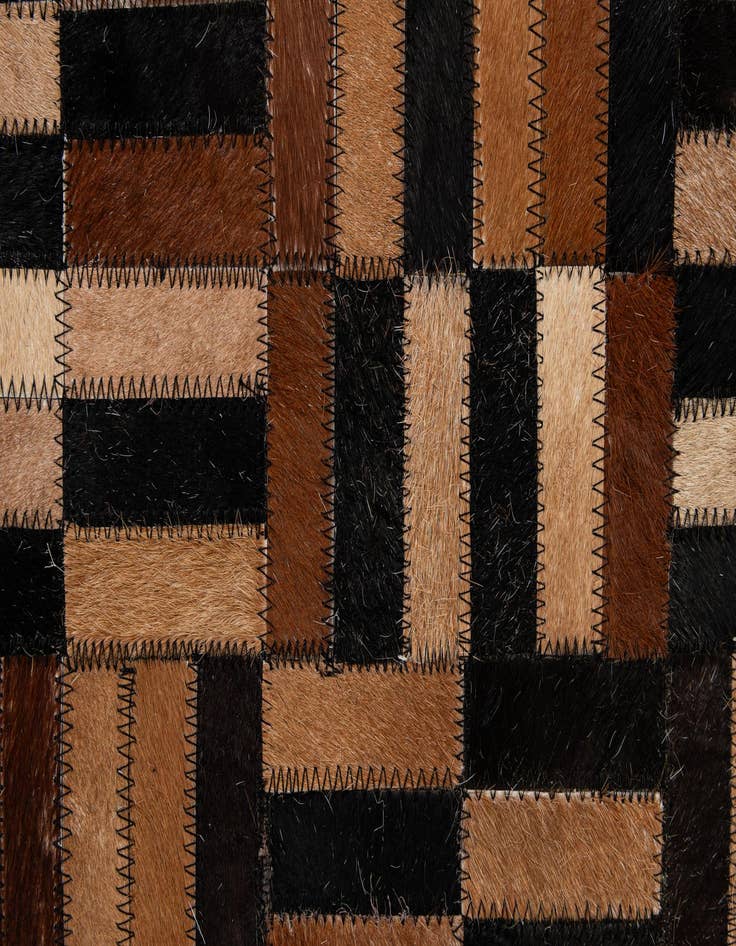 Detail image of 4' 11 x 8' 1 Cowhide - Patchwork Rug