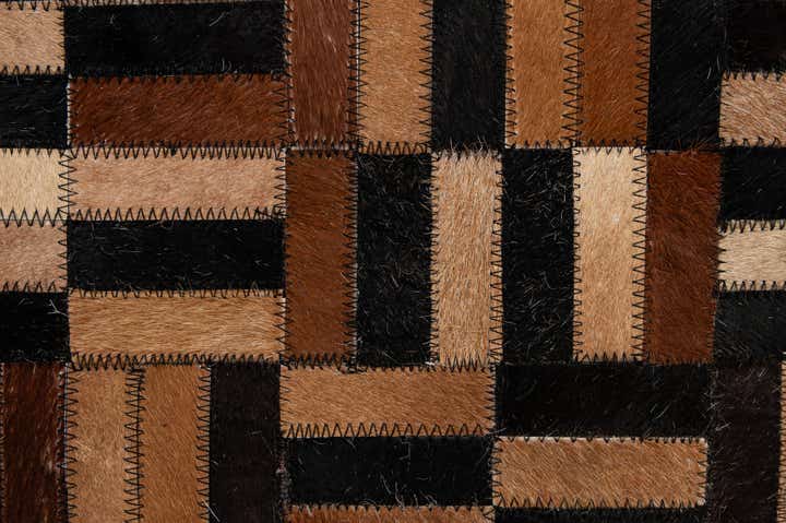 4' 11 x 8' 1 Cowhide - Patchwork Rug