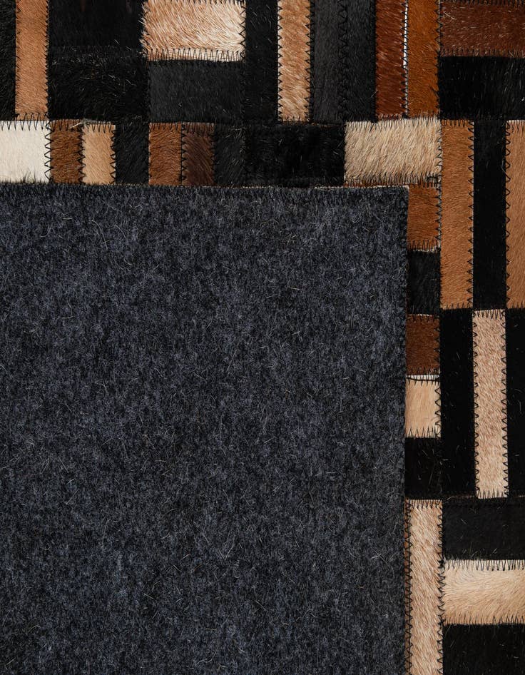 Detail image of 4' 11 x 8' 1 Cowhide - Patchwork Rug