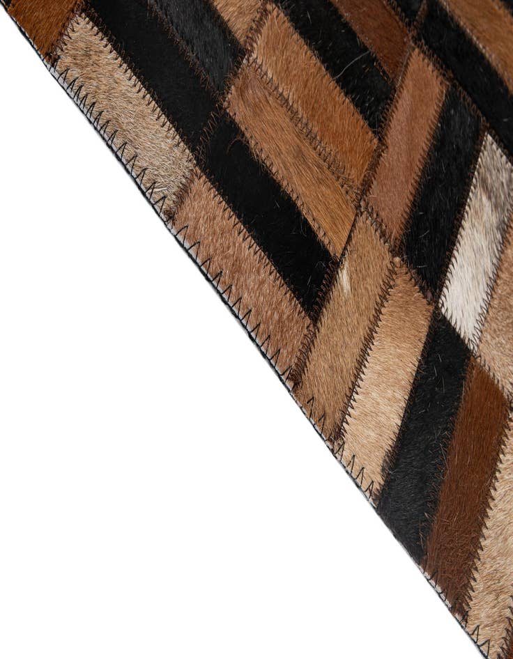 Detail image of 5' x 7' 11 Cowhide - Patchwork Rug