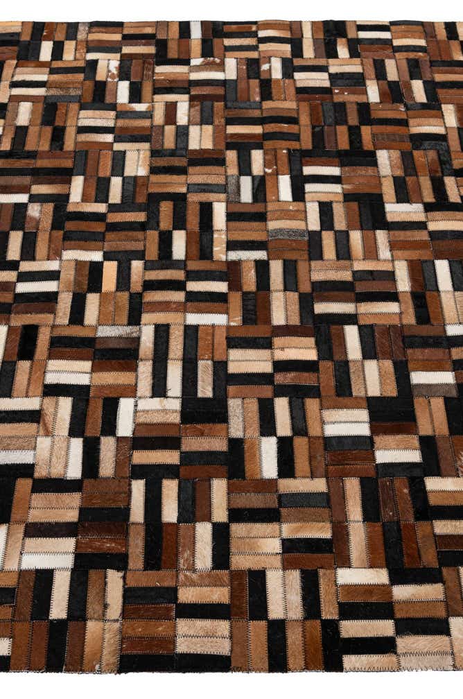 4' 11 x 7' 10 Cowhide - Patchwork Rug