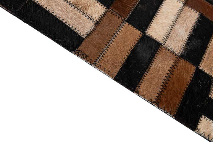 4' 11 x 7' 10 Cowhide - Patchwork Rug