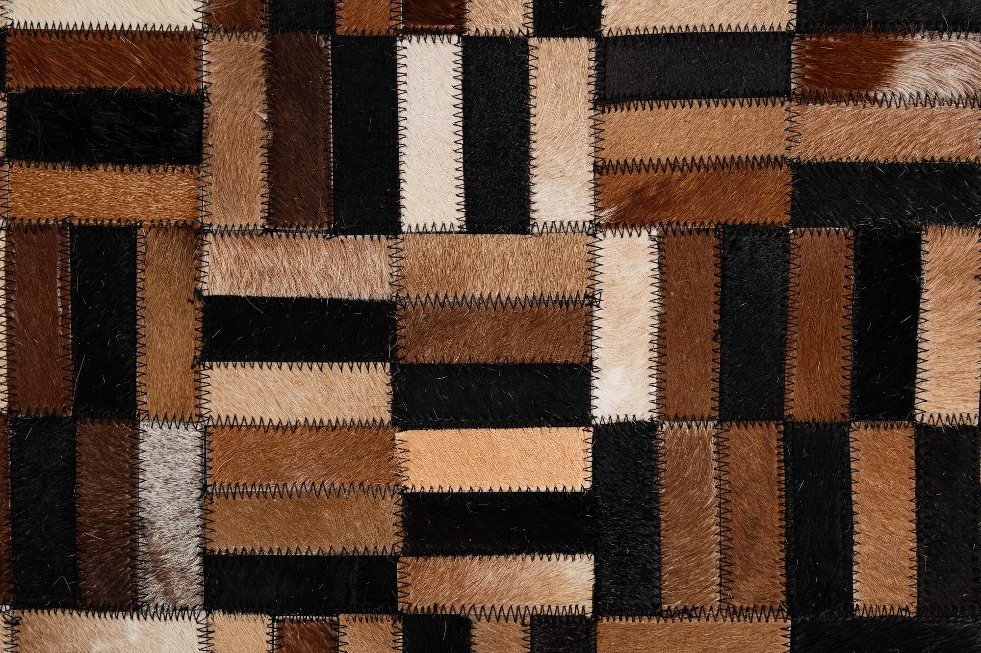 4' 11 x 7' 10 Cowhide - Patchwork Rug